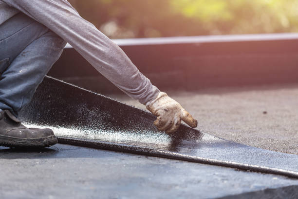 Professional Basement Waterproofing technician working in Boston, GA
